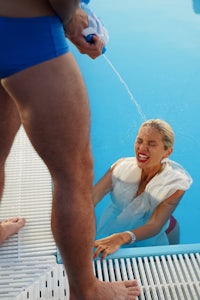 a man and a woman in a swimming pool